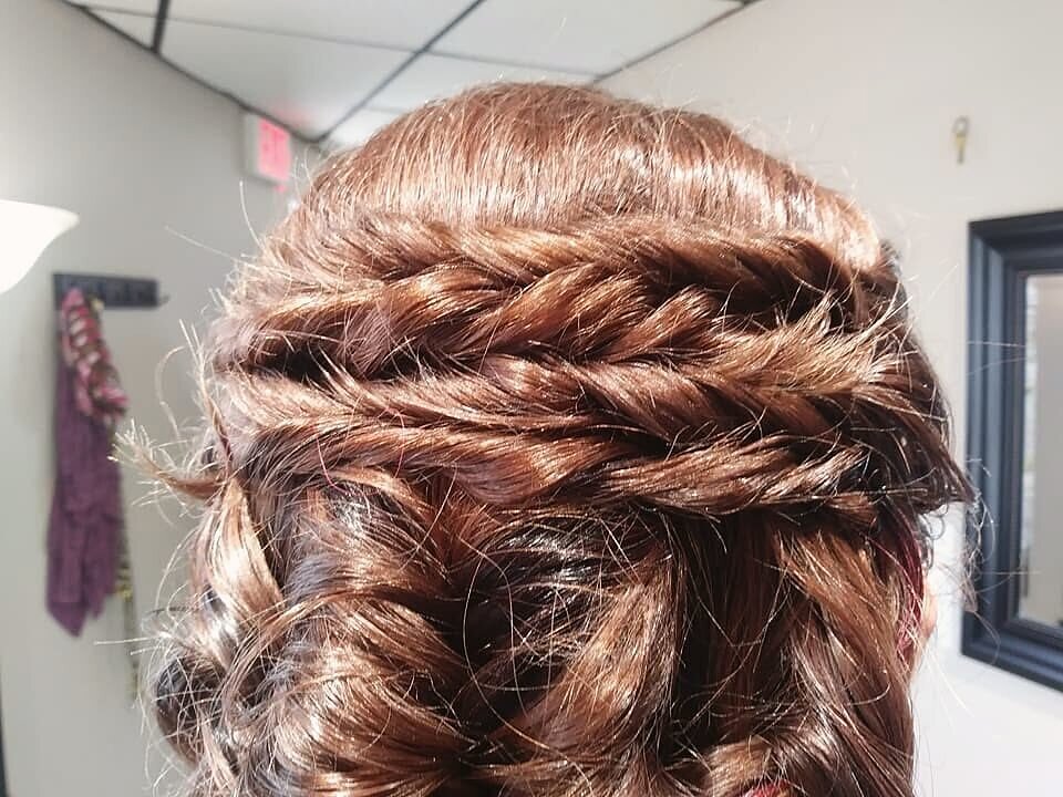 Braided updo styled for an event at Blown Away Salon, Louisville