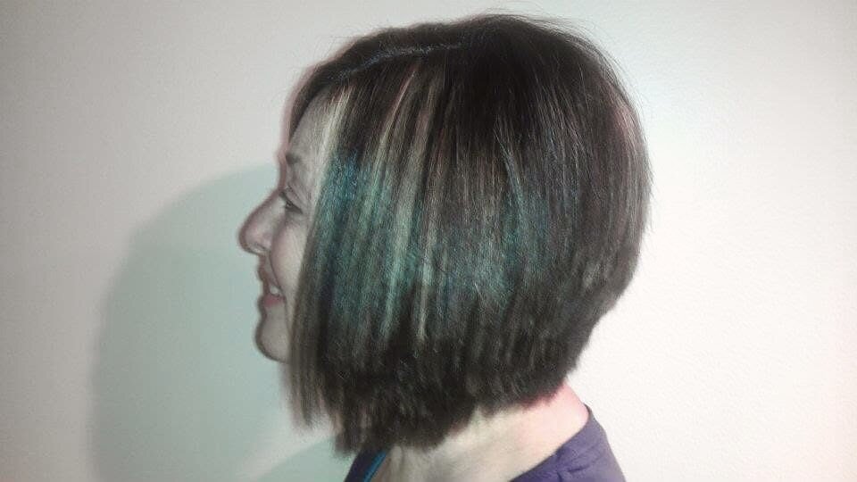 Hand-painted dimensional hair color on a sleek bob at Blown Away Salon in Louisville, KY